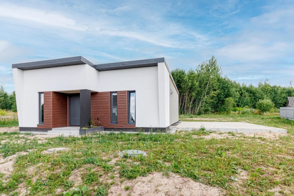 View of a small modern house immediately after construction. Step house construction system
